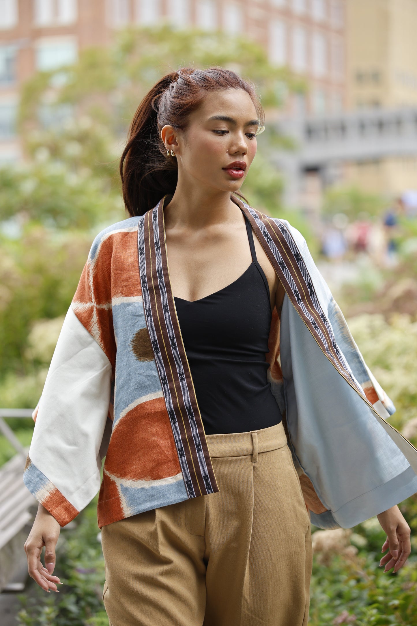 Samurai Poncho in lightblue linen printed with north weave
