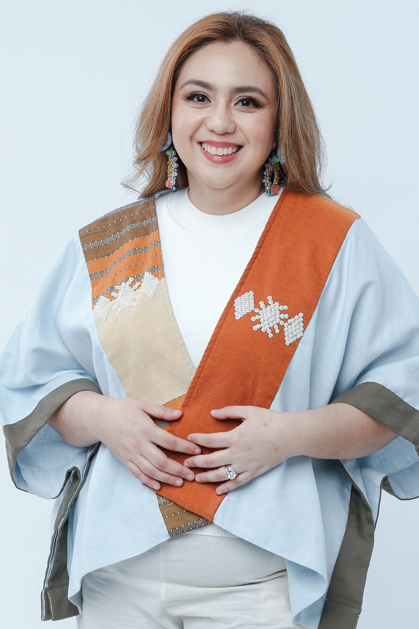 Heritage Poncho in Light Blue with Orange Highlight