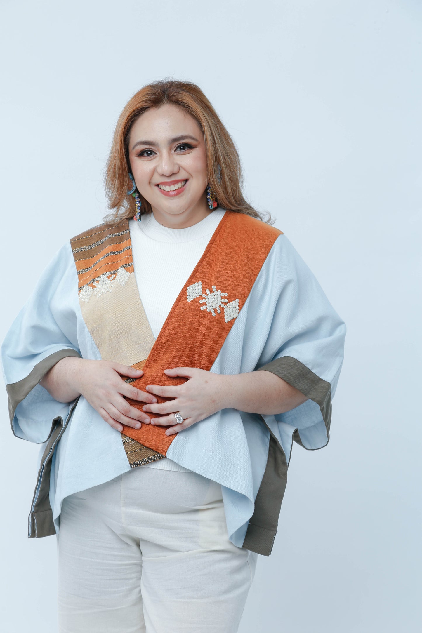 Heritage Poncho in Light Blue with Orange Highlight
