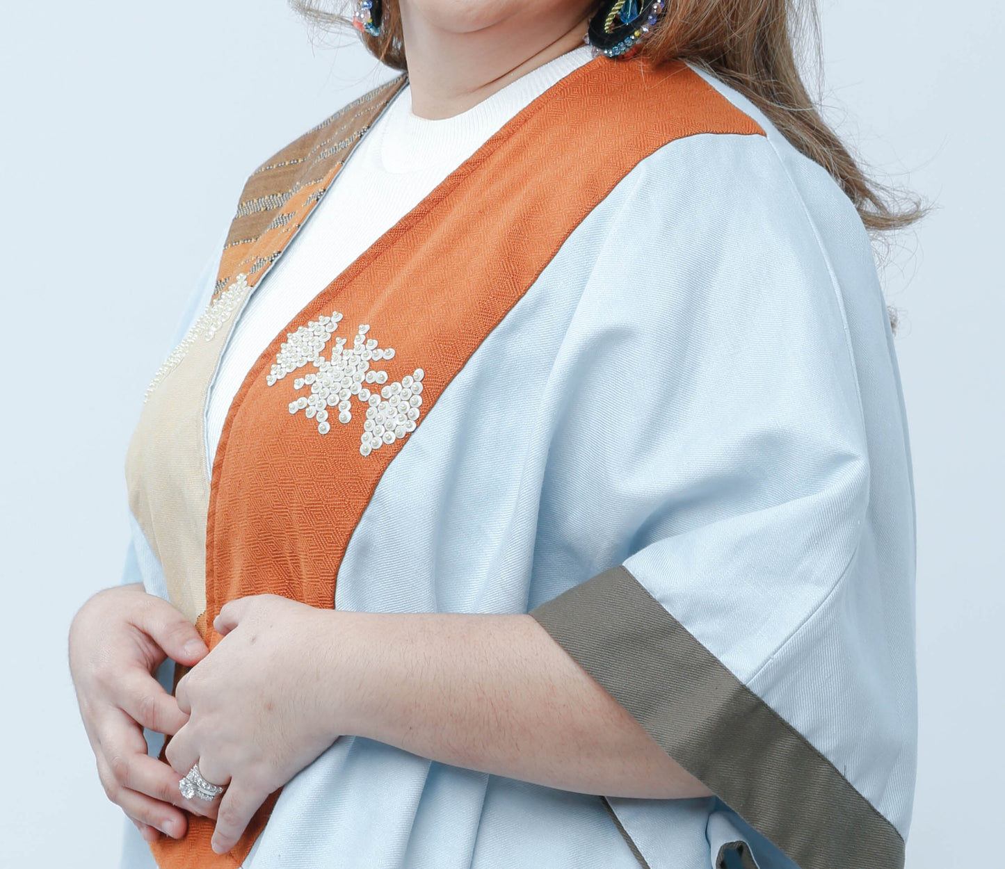 Heritage Poncho in Light Blue with Orange Highlight