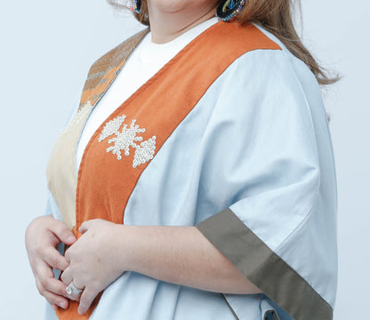 Heritage Poncho in Light Blue with Orange Highlight