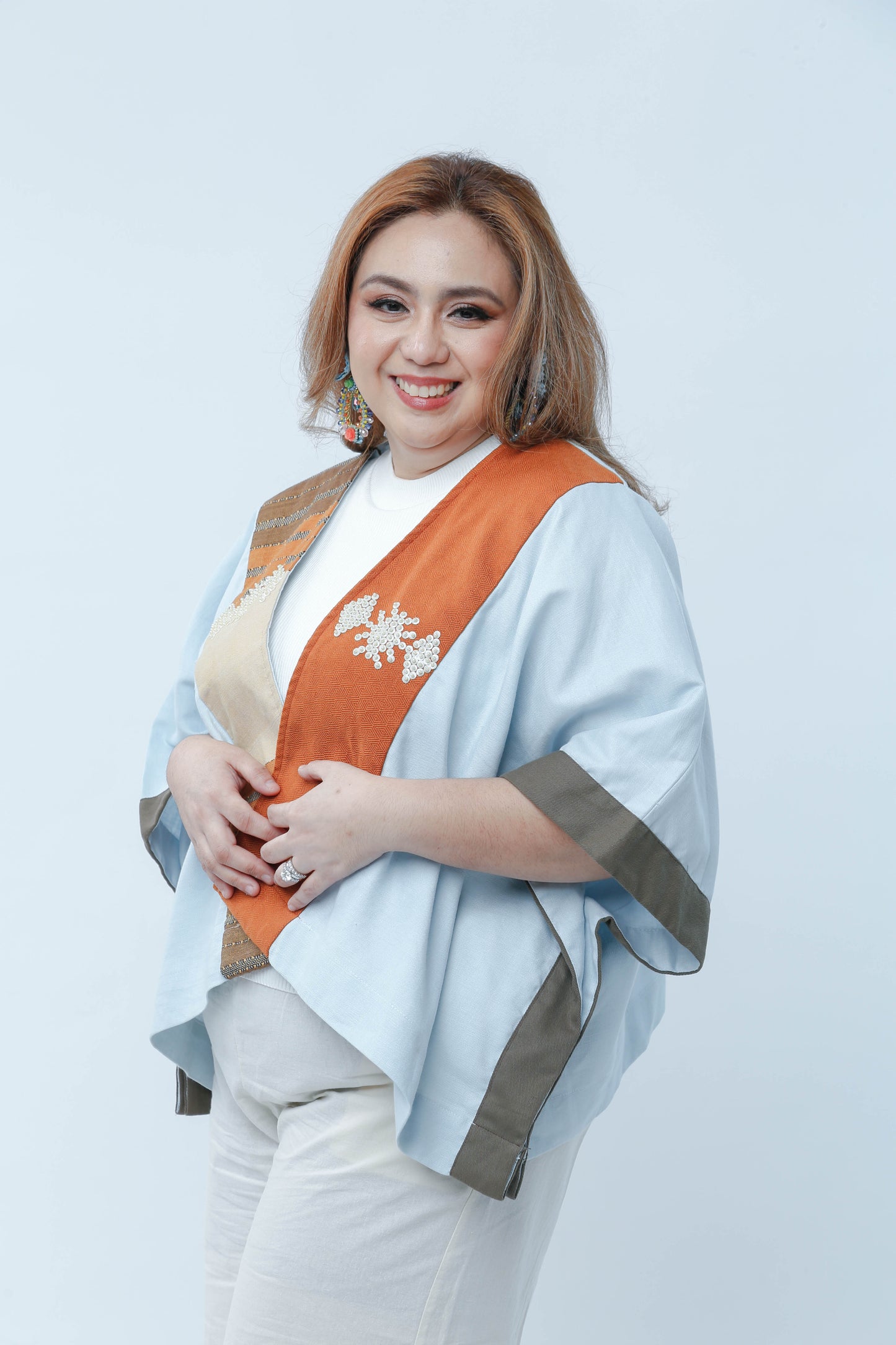 Heritage Poncho in Light Blue with Orange Highlight