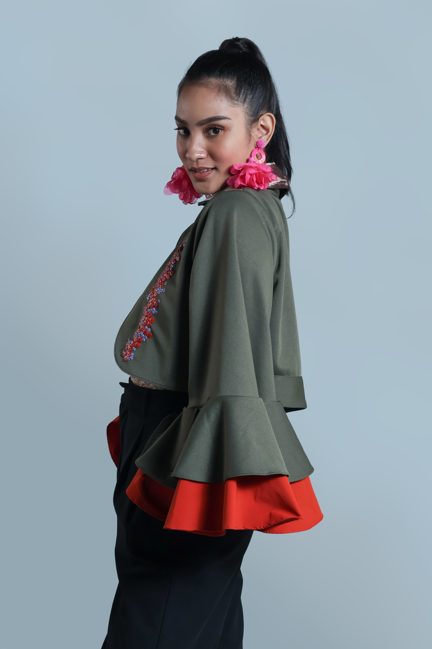 LEAD SINGER PONCHO IN MOSS GREEN WITH BEAD EMBELLISHMENTS
