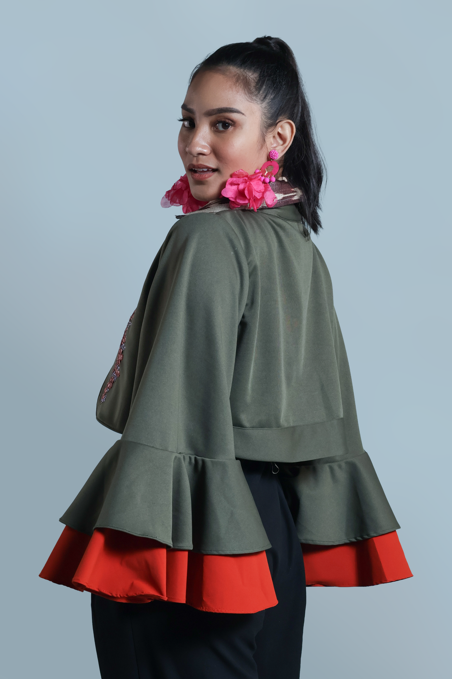 LEAD SINGER PONCHO IN MOSS GREEN WITH BEAD EMBELLISHMENTS
