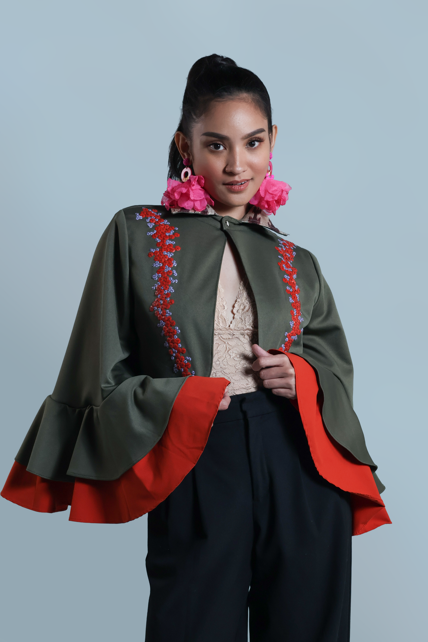 LEAD SINGER PONCHO IN MOSS GREEN WITH BEAD EMBELLISHMENTS