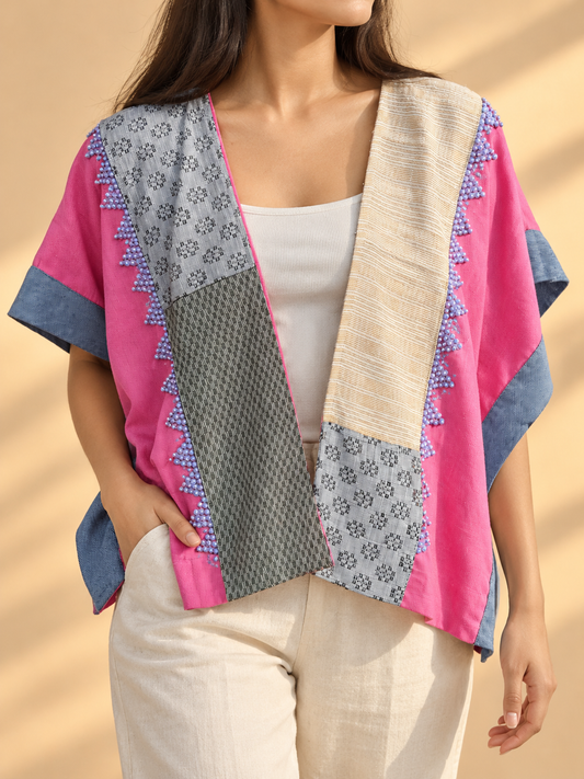 HERITAGE PONCHO IN MIXED PINK WITH MULTI PATTERN WEAVE