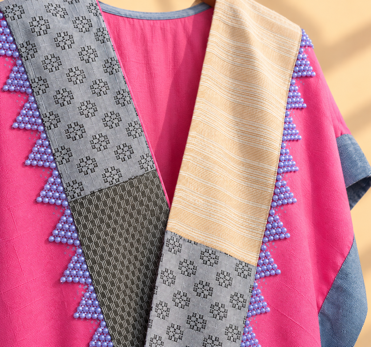 HERITAGE PONCHO IN MIXED PINK WITH MULTI PATTERN WEAVE