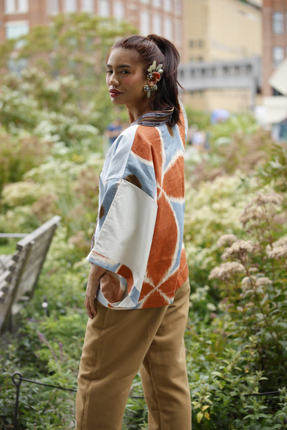 Samurai Poncho in lightblue linen printed with north weave