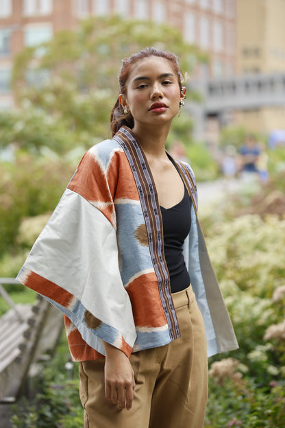 Samurai Poncho in lightblue linen printed with north weave