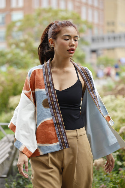Samurai Poncho in lightblue linen printed with north weave