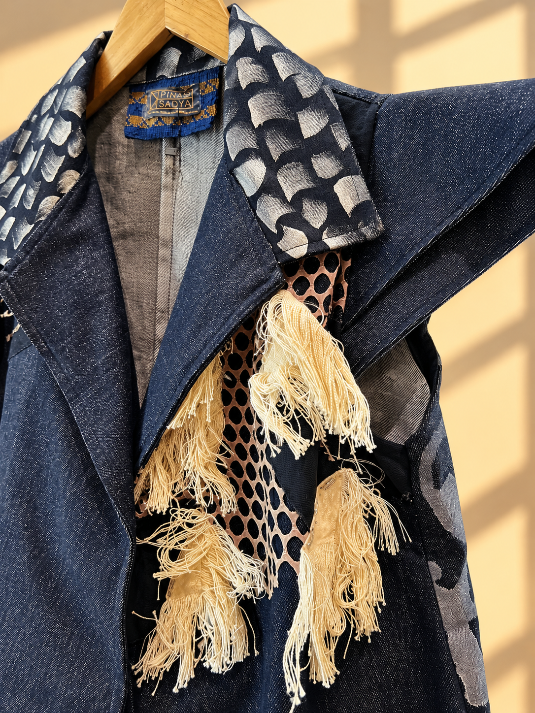 AGAW PANSIN CAPE TRENCH IN DENIM WITH BEADWORKS and TASSEL