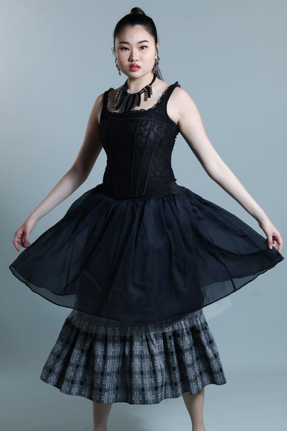 GARTERIZED SKIRT IN BLACK BINAKOL WEAVE