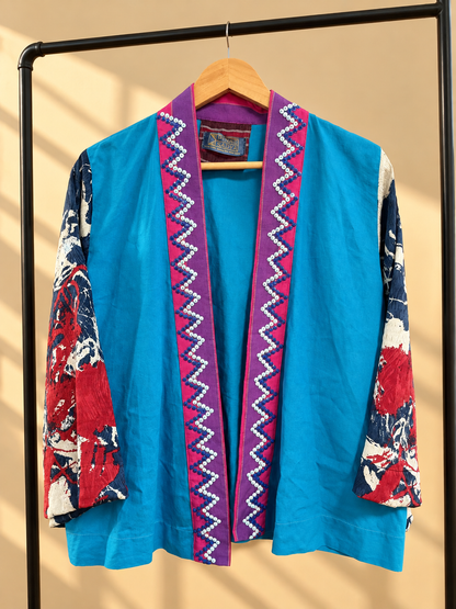 SAMURAI PONCHO IN BLUE SATIN WITH PINK KANTARINES COLLAR